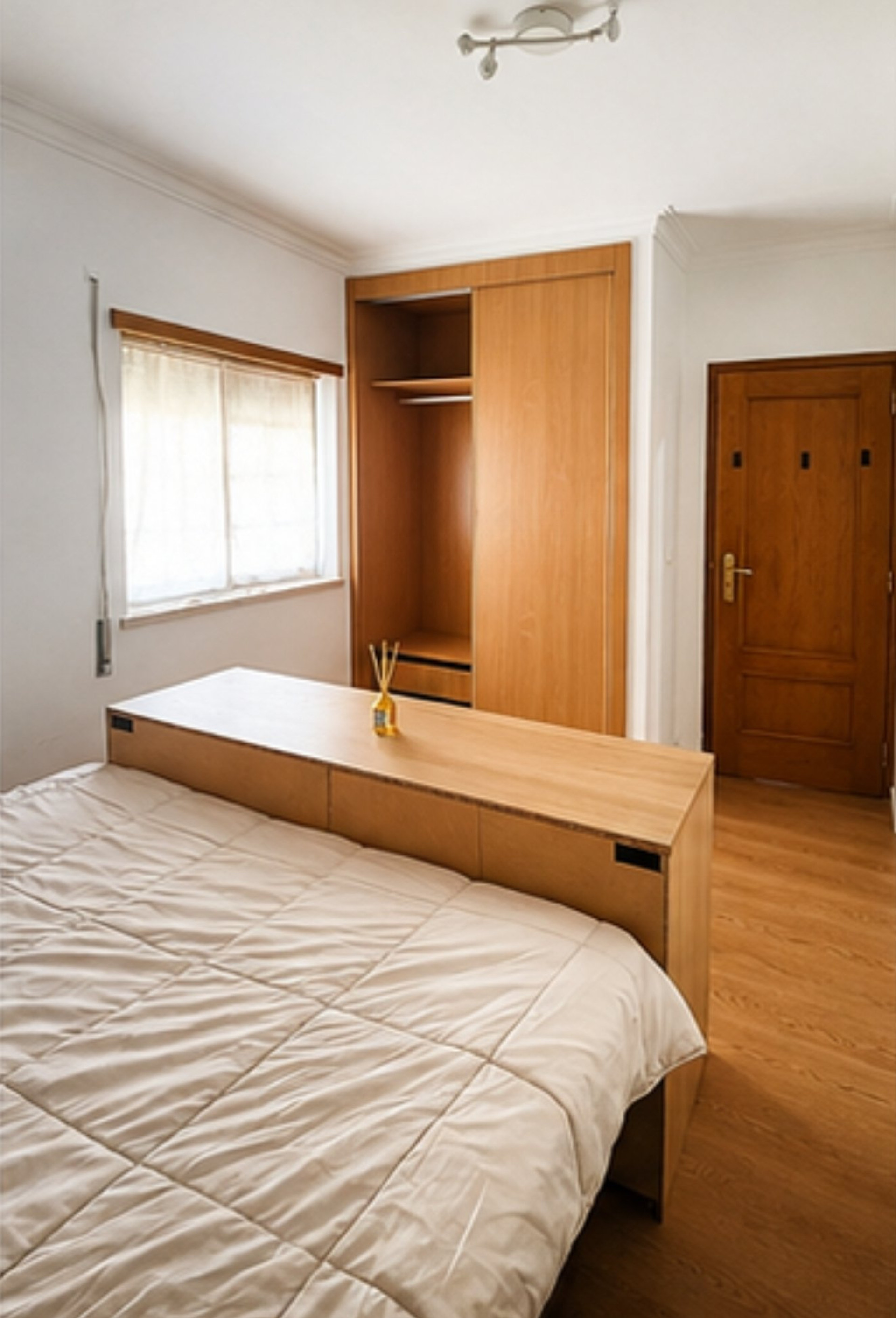 Bedroom with built-in wardrobe