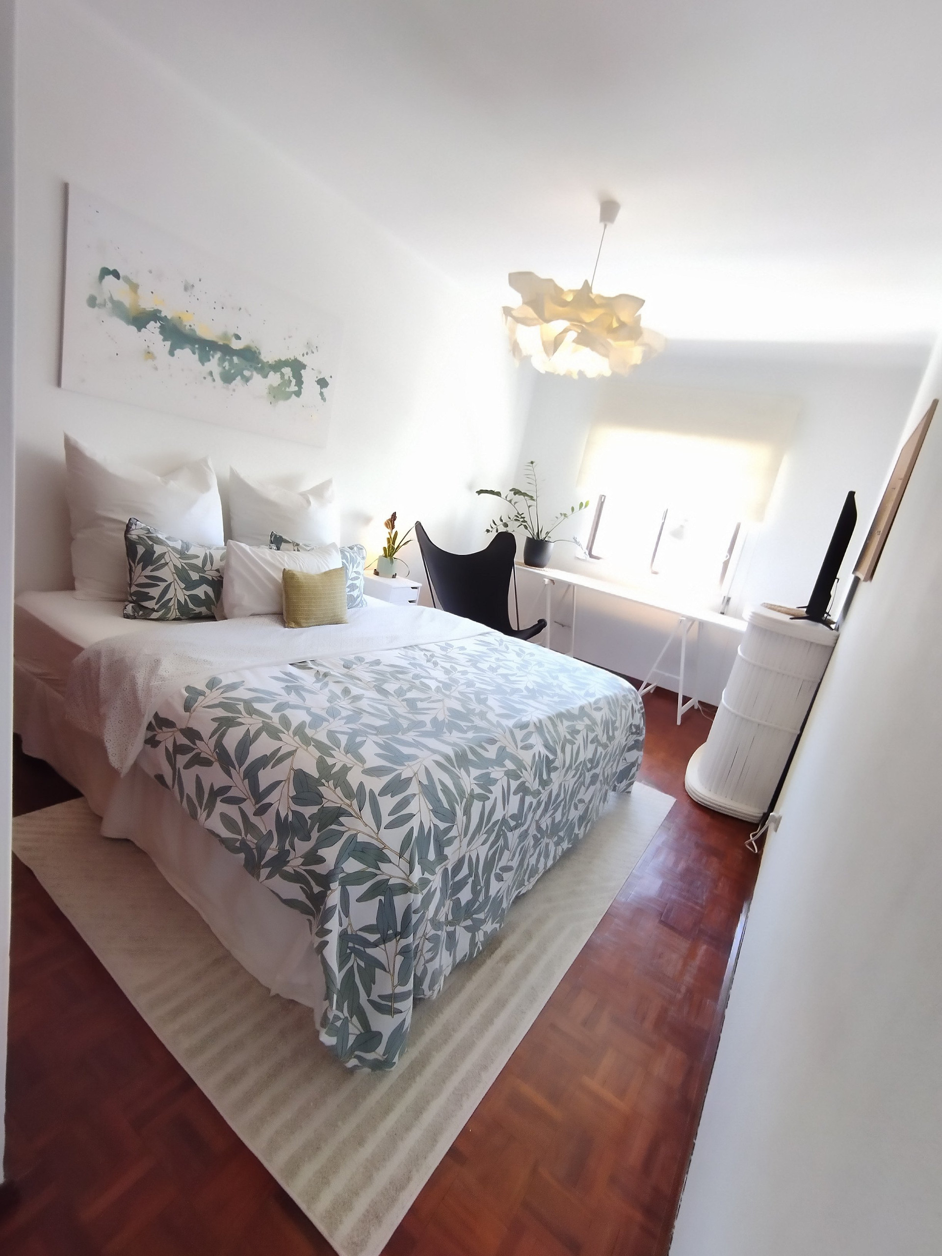 Bright bedroom with queen bed