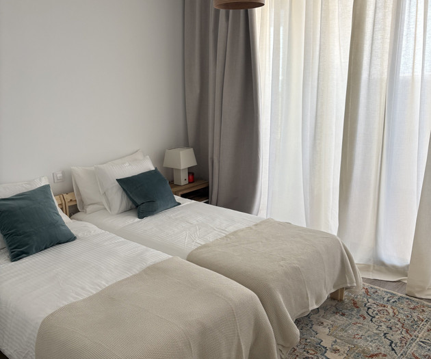 Bedroom bed with curtains