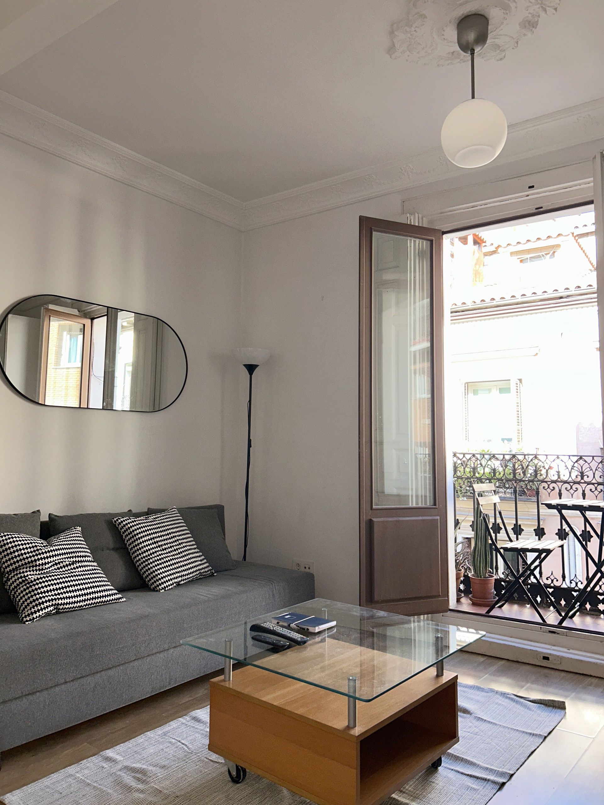 Bright living room with balcony
