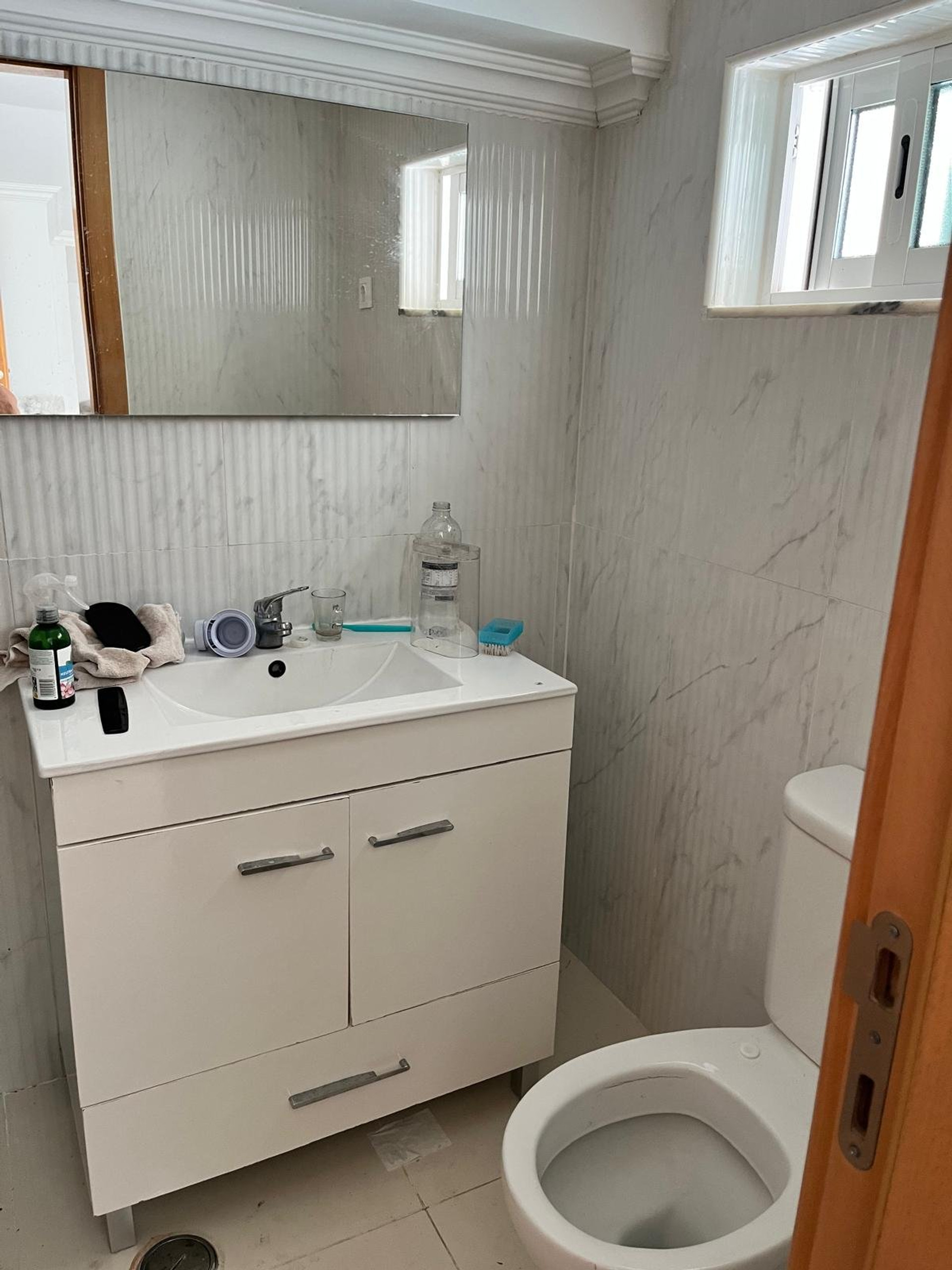 Bathroom with vanity and toilet