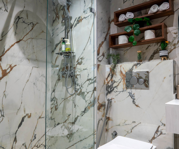 Marble bathroom with glass shower