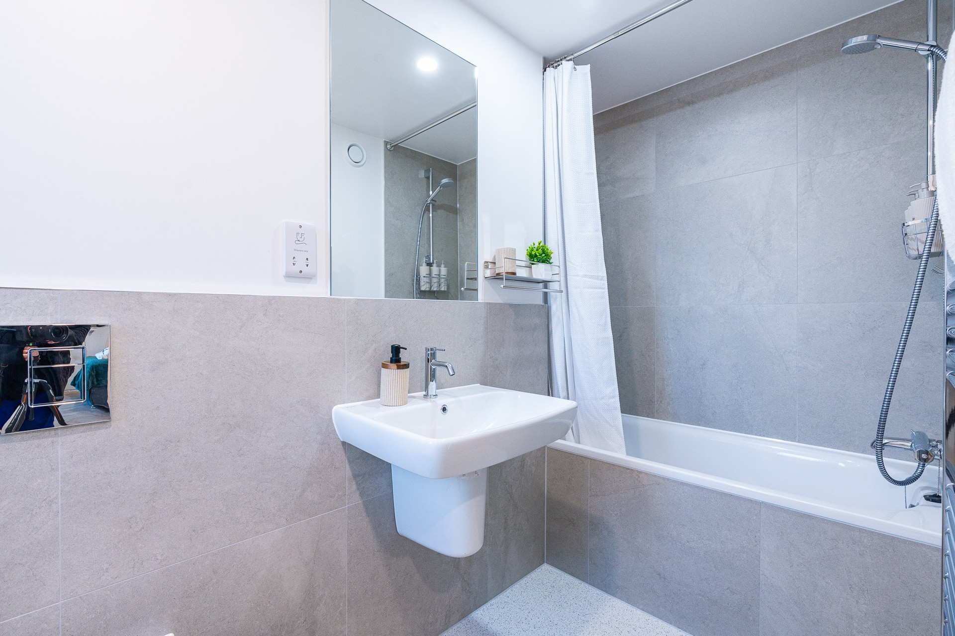 Bathroom with tub and shower