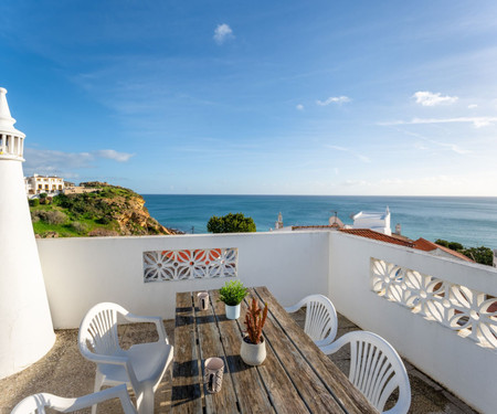 Comfy Flat W/ Rooftop Beach View by LovelyStay