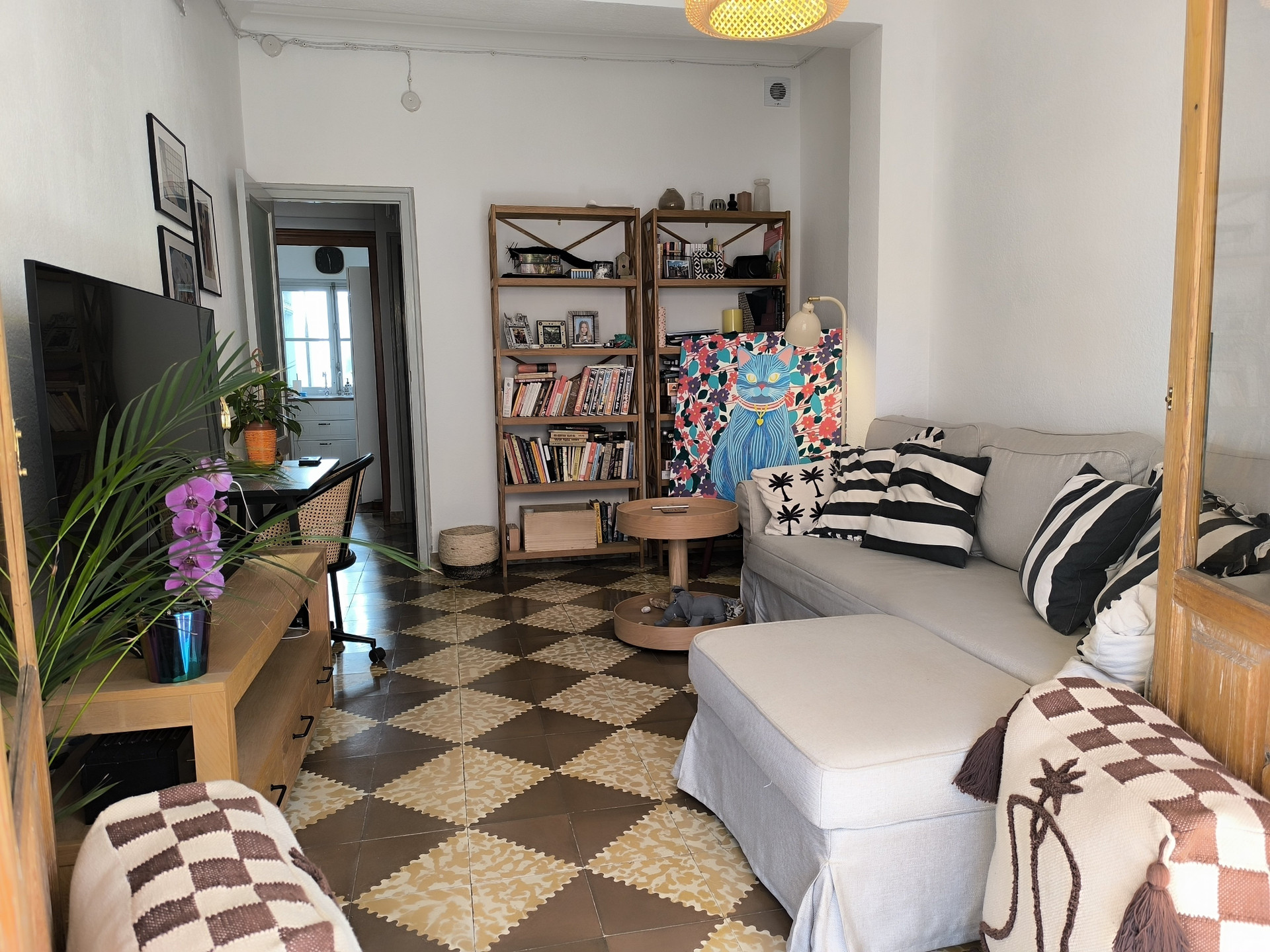 Living room with bookshelf and sofa