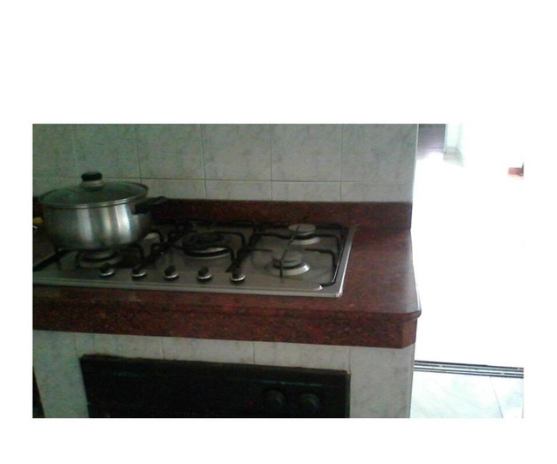 Kitchen stove with pot