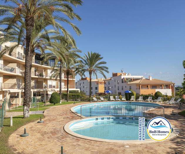 BnB Homes apartment with cozy Terrace & pool