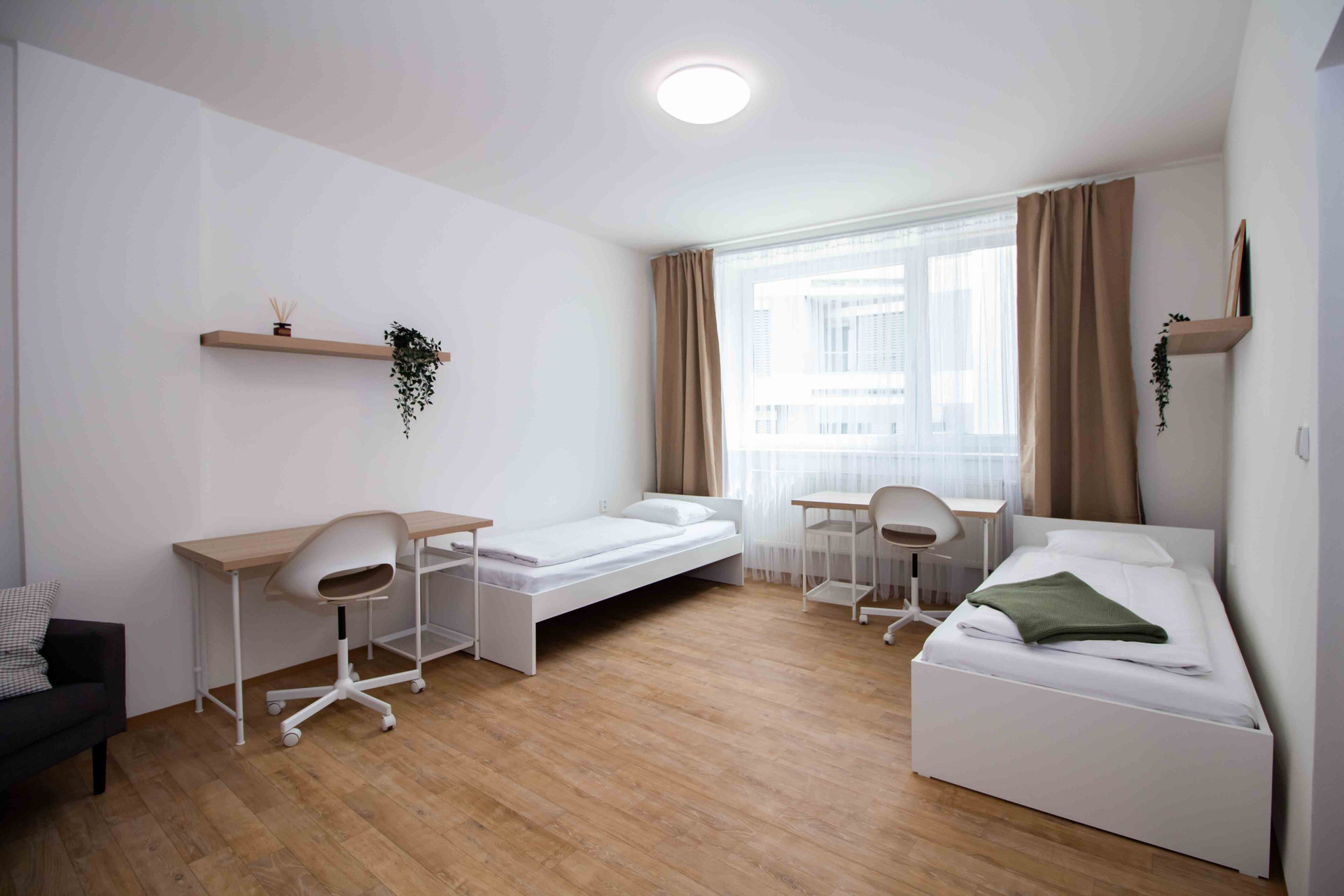 Bright twin bedroom with desks