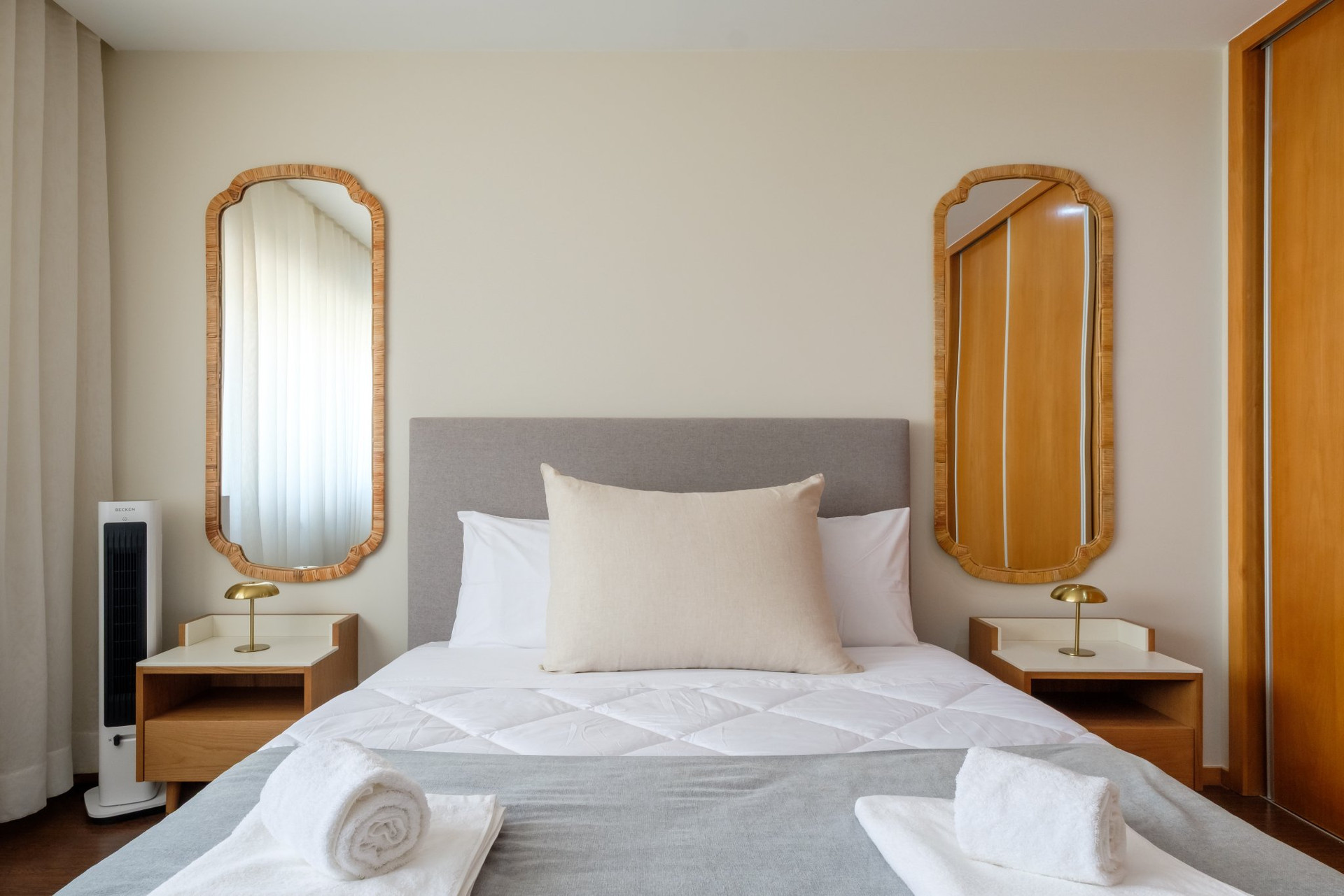 Bedroom with twin mirrors