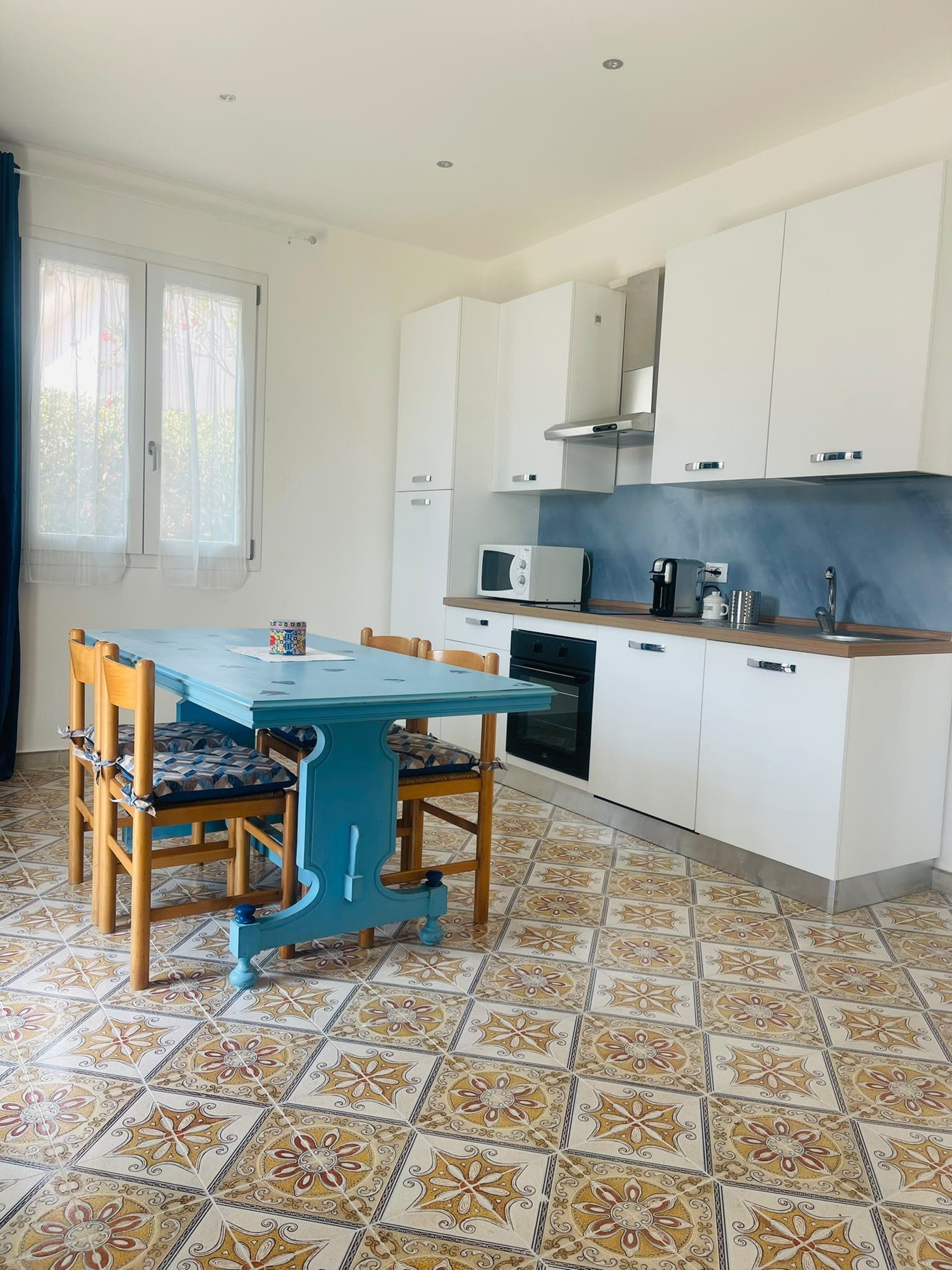 Kitchen with blue dining table