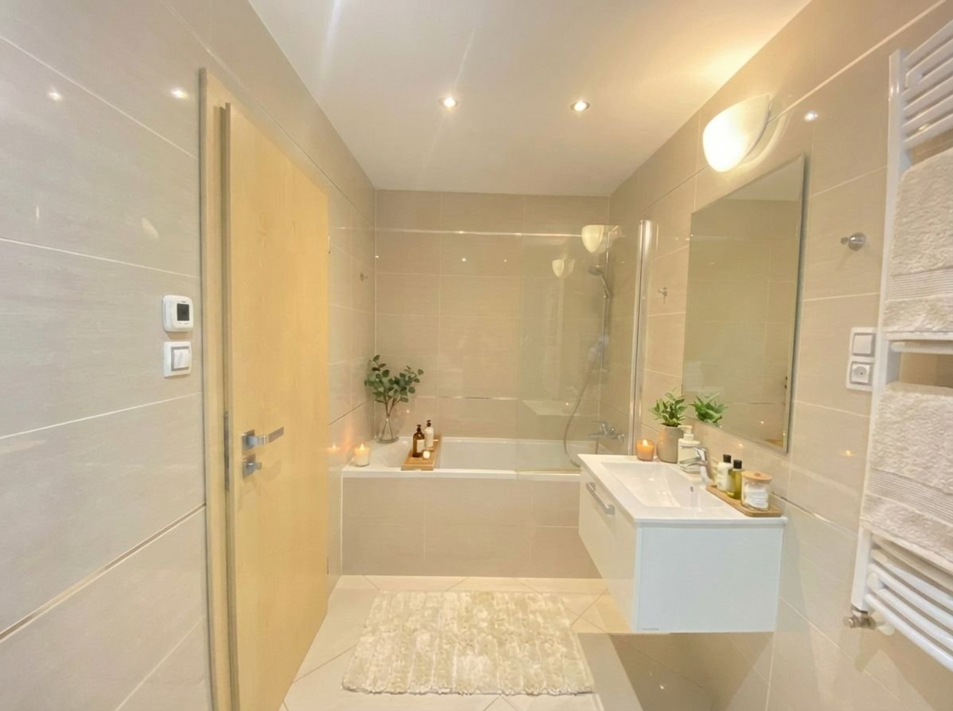 Bathroom with bathtub and vanity