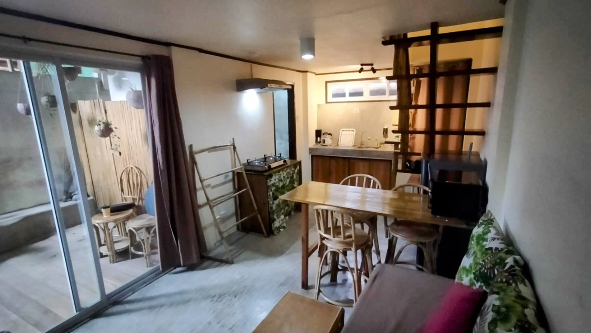 Living room with dining table and kitchen