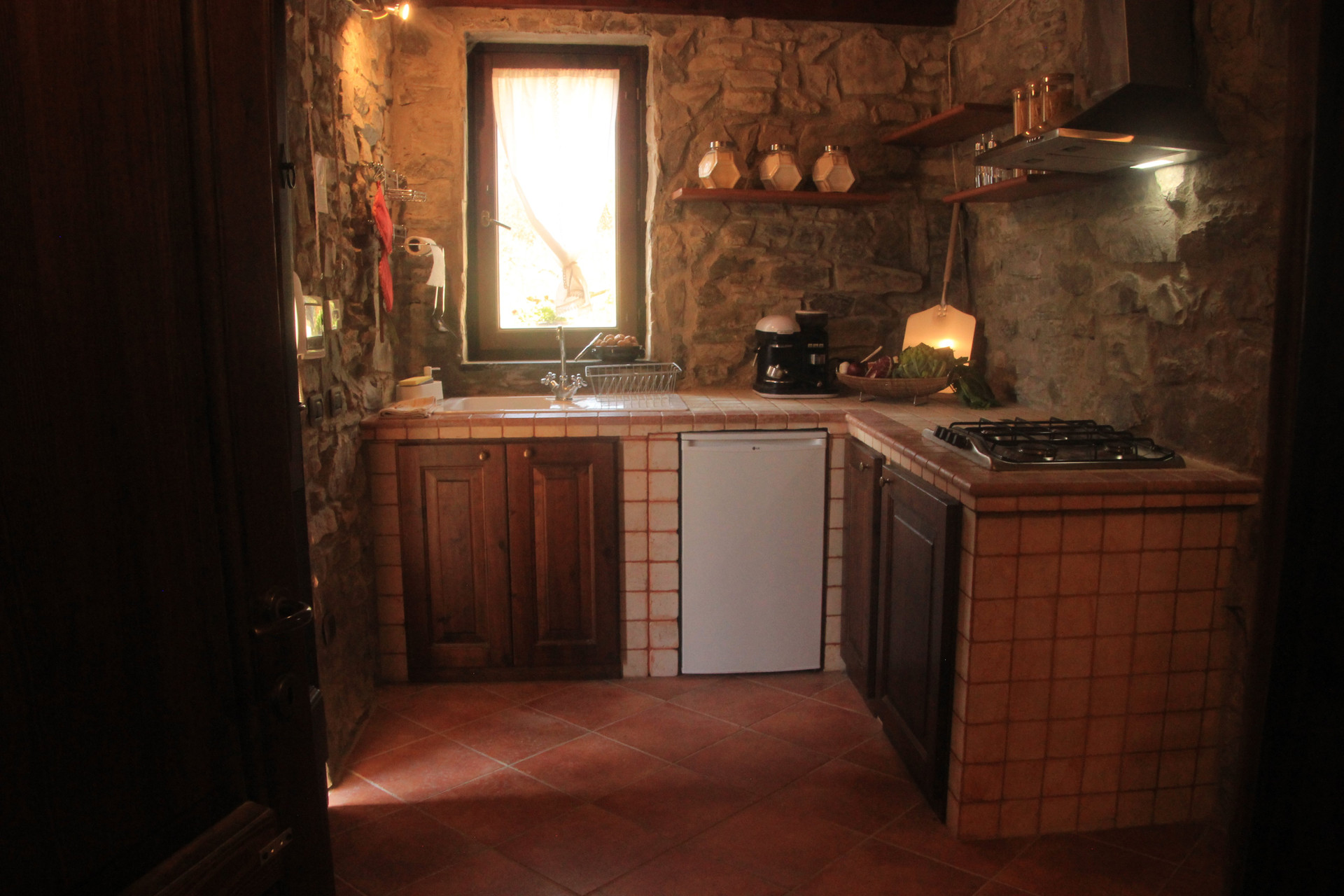 Rustic kitchen with tiled counters