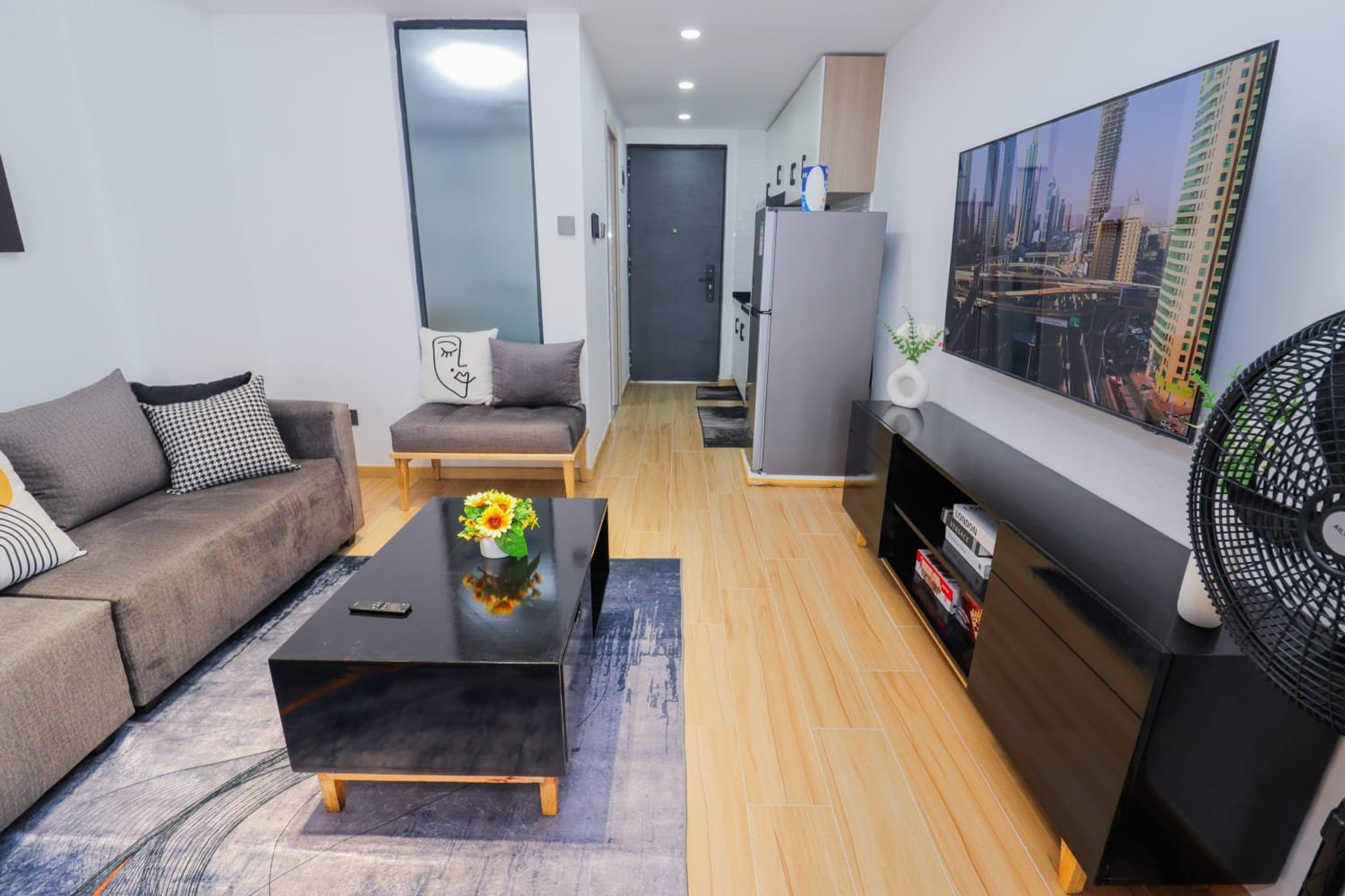 Living room with wall-mounted TV