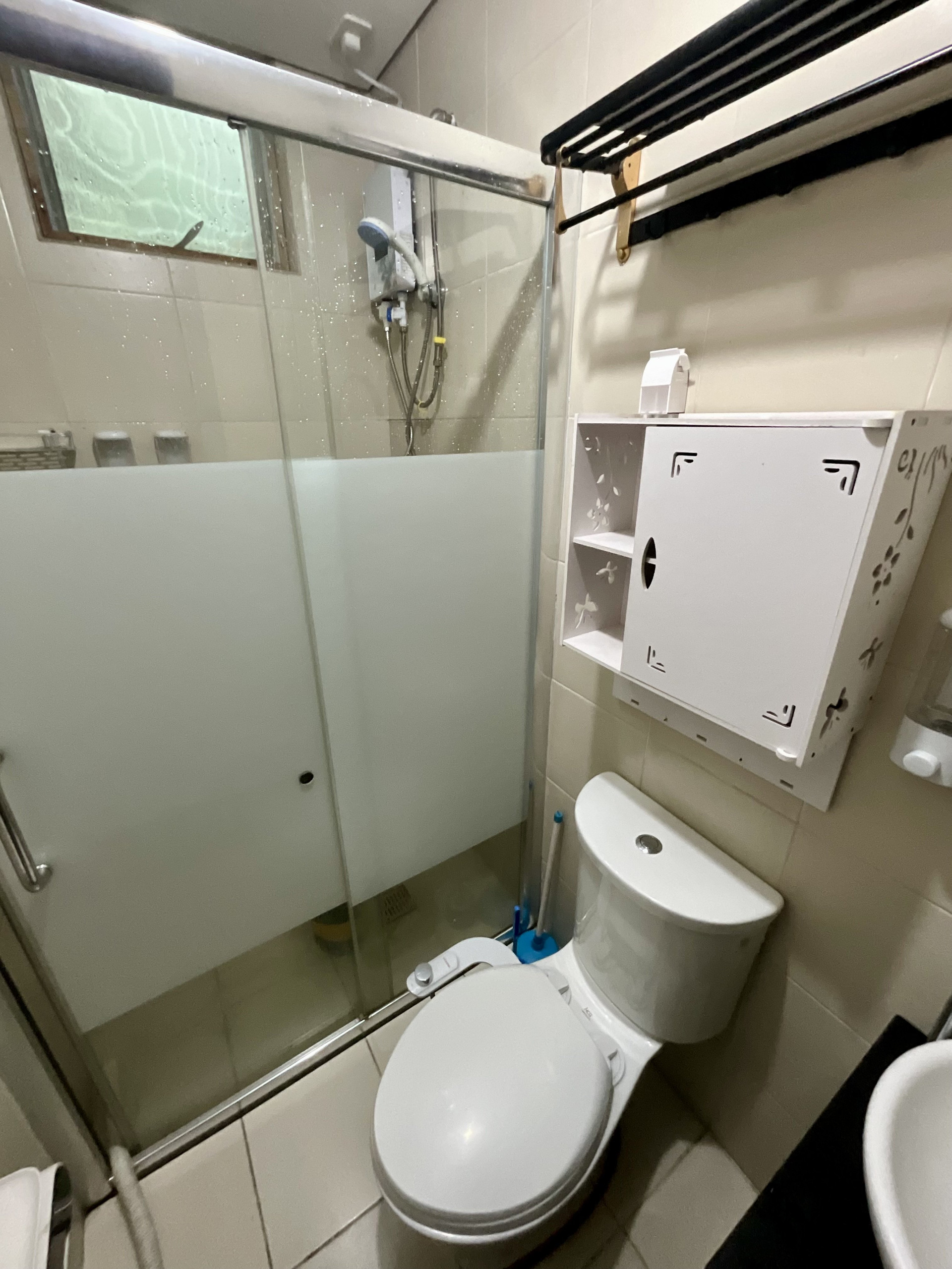 Bathroom with glass shower and toilet