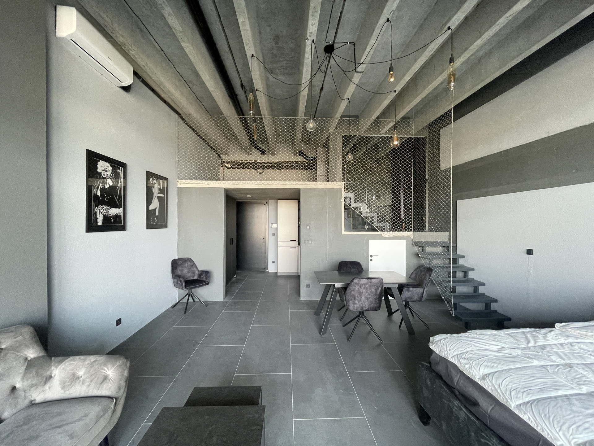 combined living, dining, bedroom