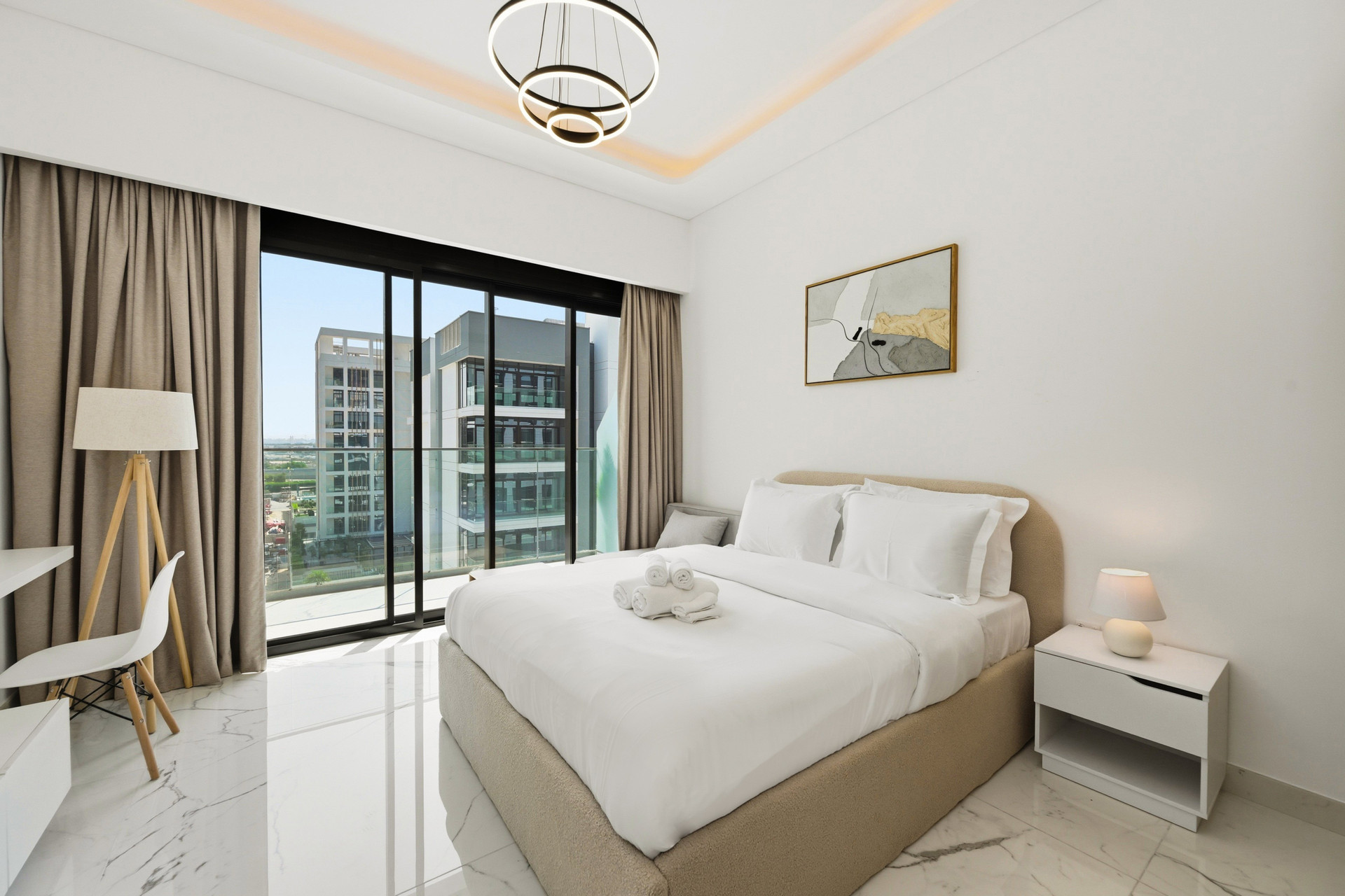 Bright bedroom with city view