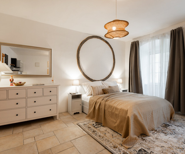 Bedroom with dresser and mirror
