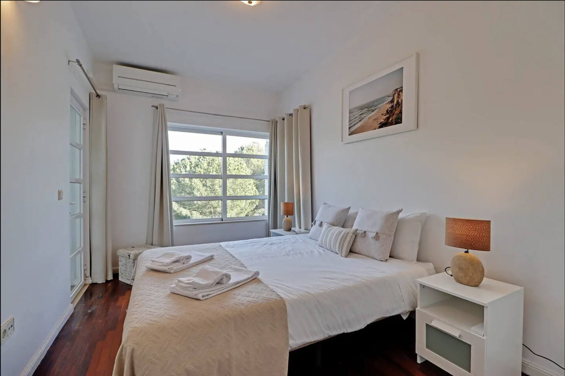 Bedroom with double bed and wardrobe