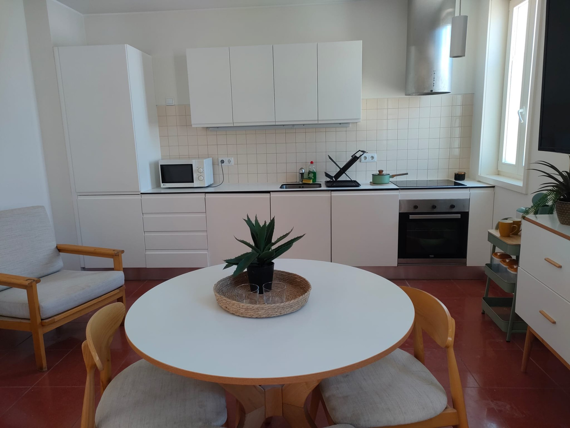 Open kitchen with round dining table