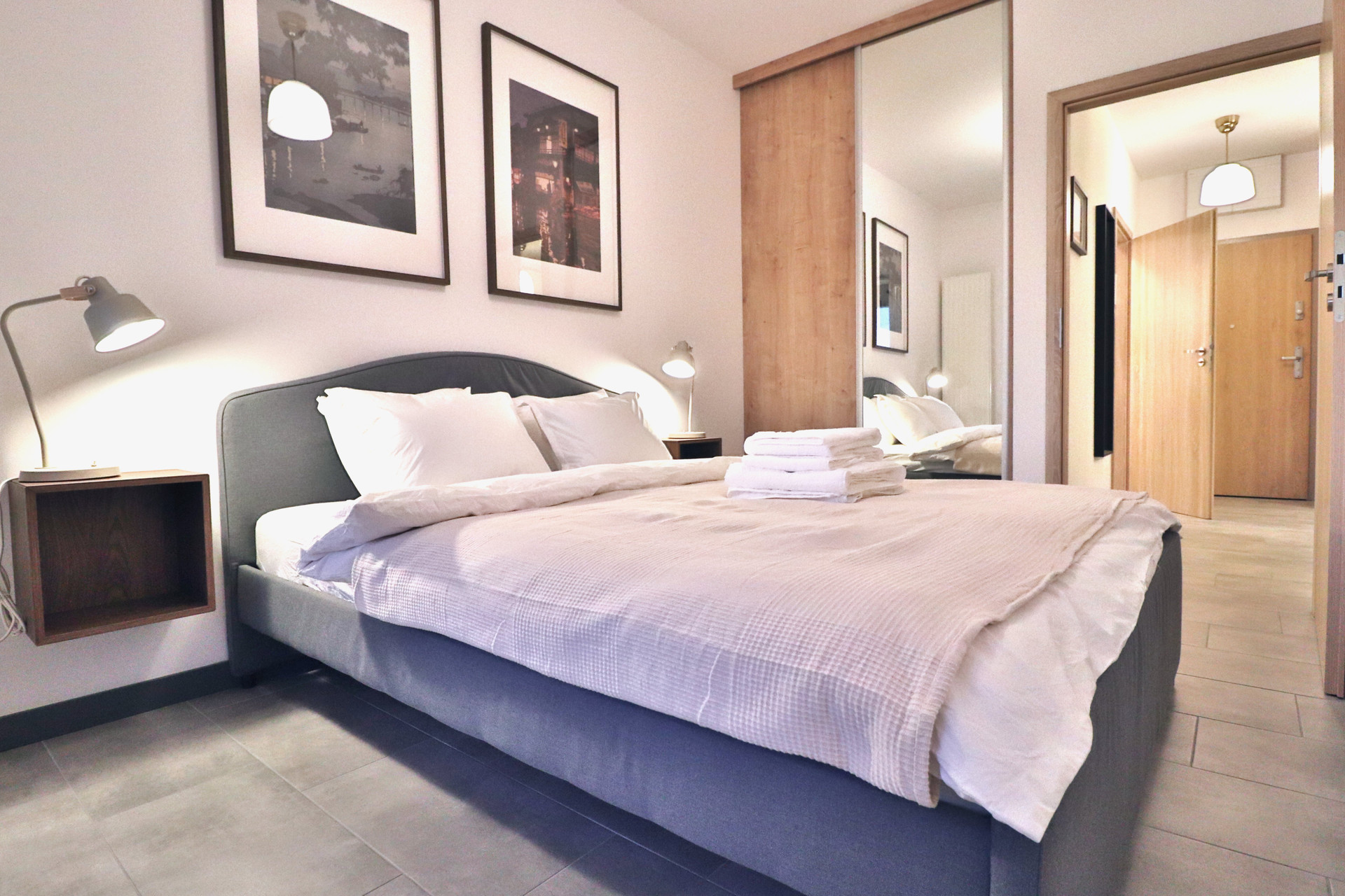 Bedroom with double bed and wardrobe