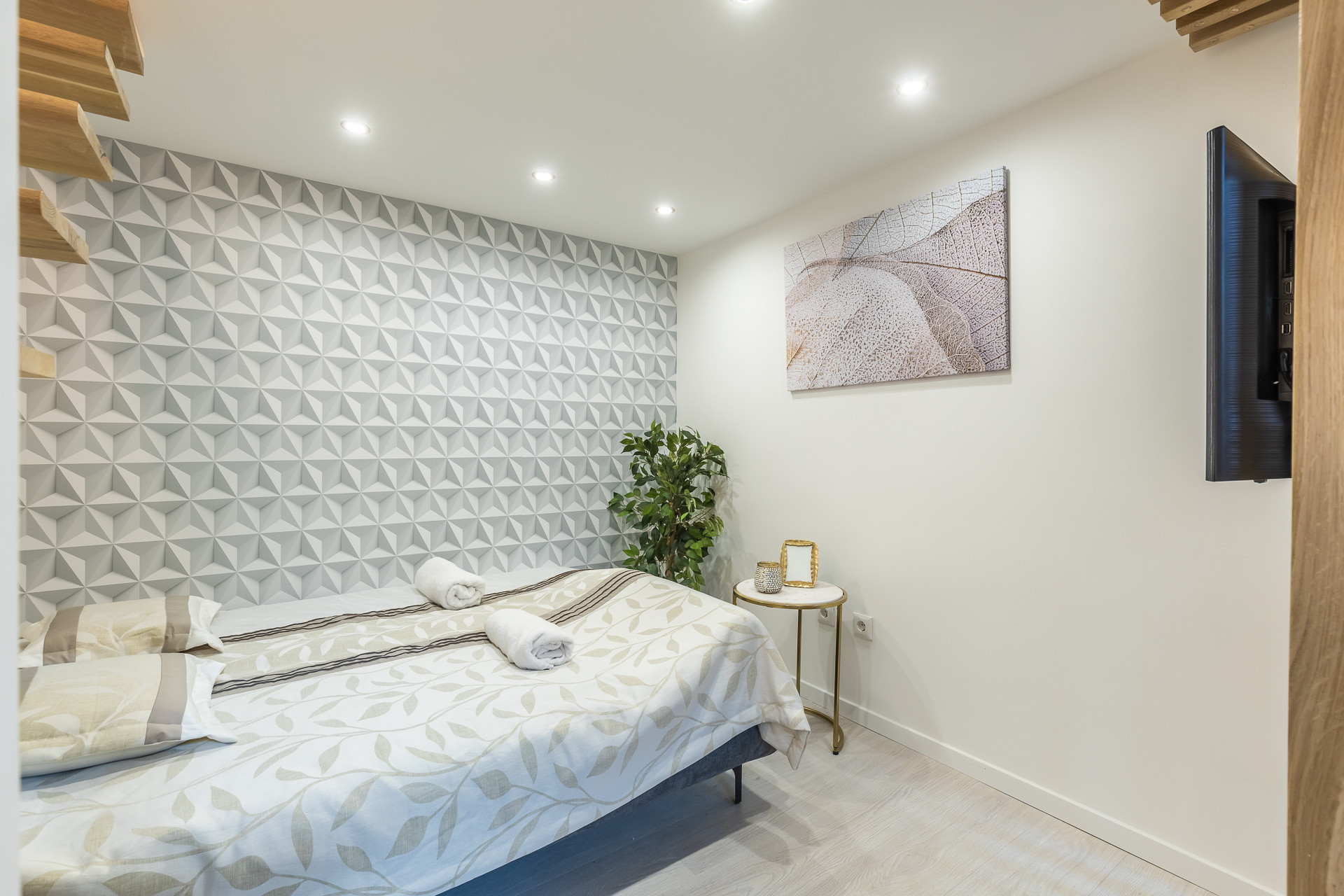 Cozy bedroom with wall art