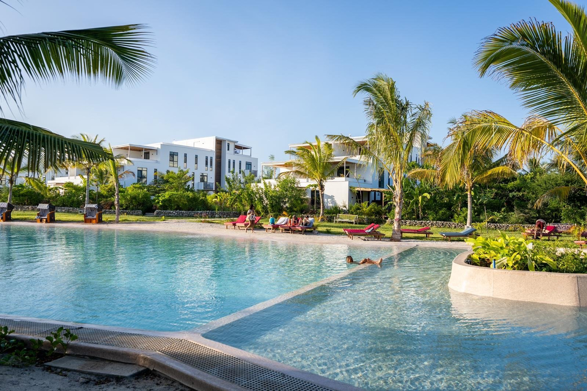 Lagoon pool with sun loungers