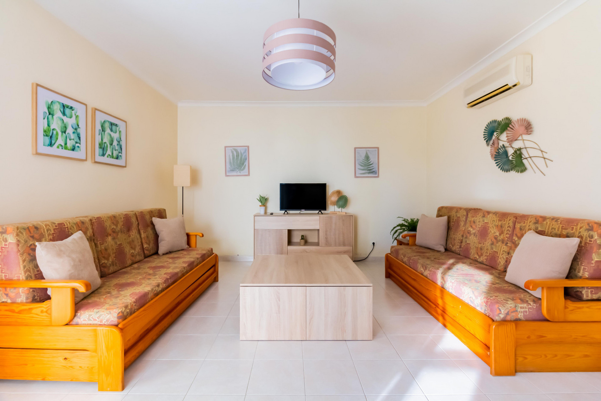Living Room with Flat Screen TV and 2 Sofa-Beds