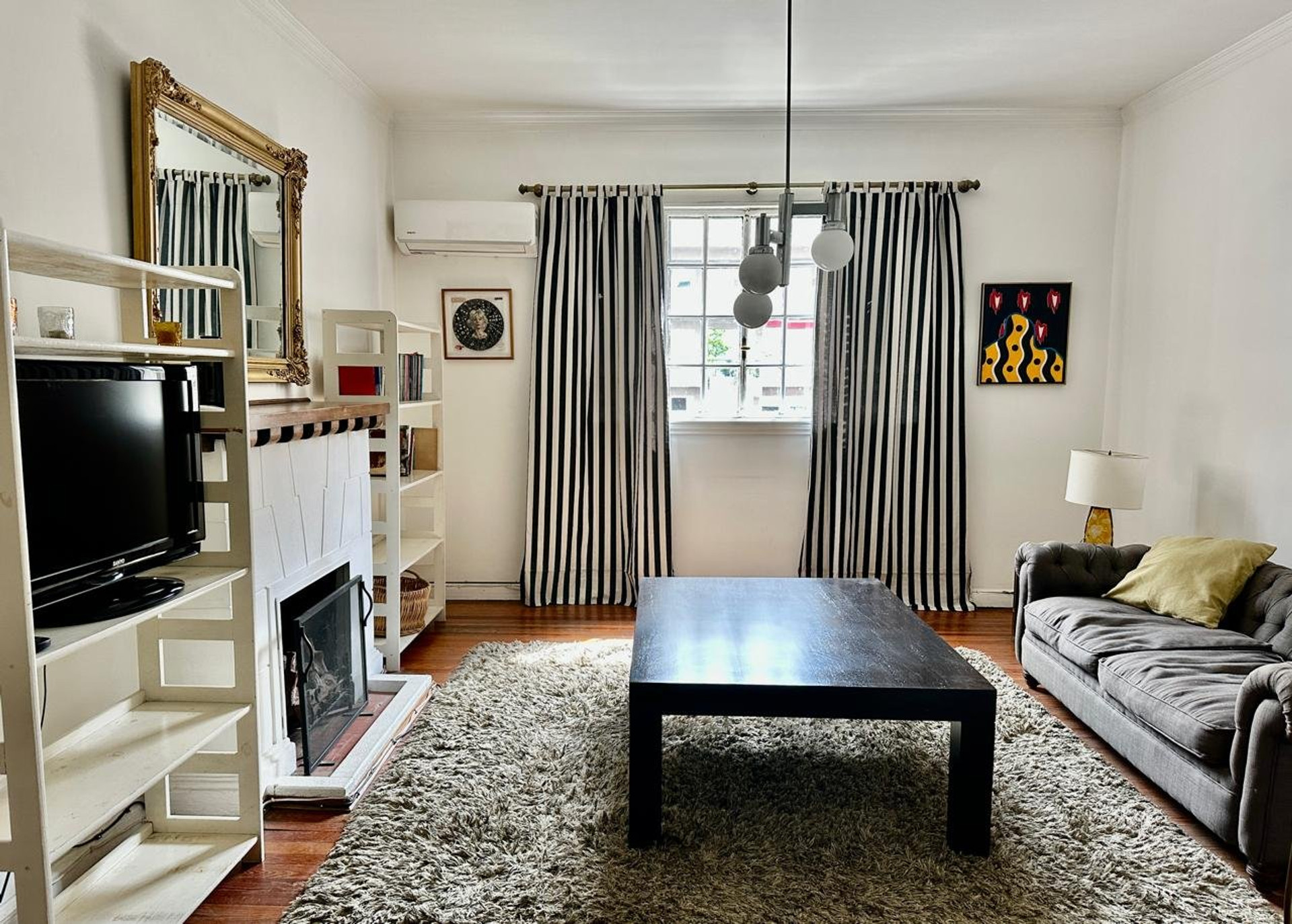 Living room with fireplace and sofa