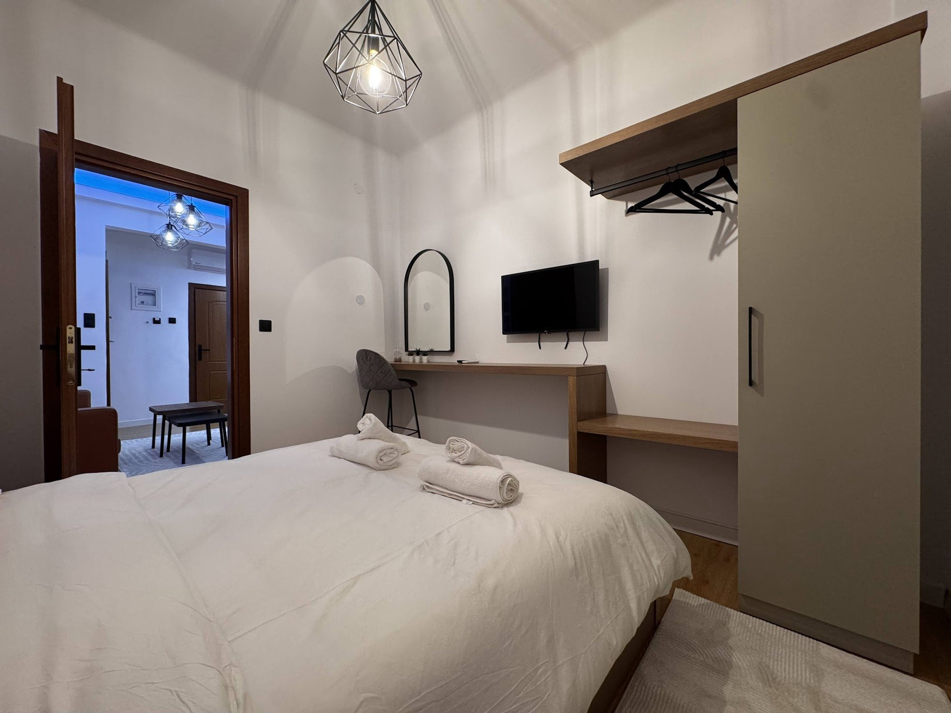 Bedroom with double bed and wardrobe