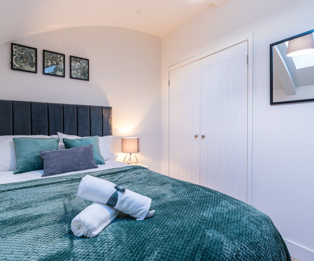 Double bed with built-in wardrobe
