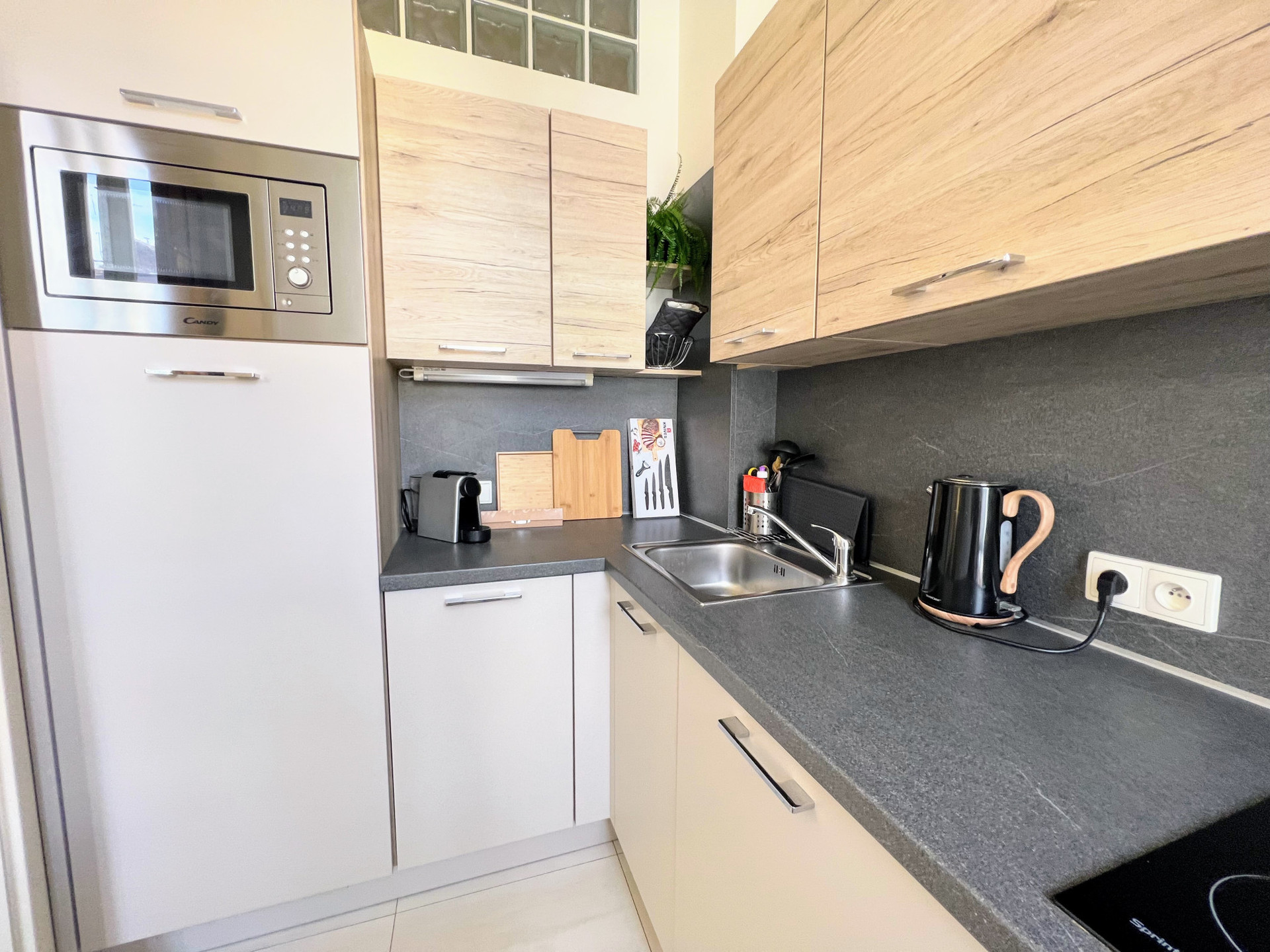 Modern kitchen with microwave sink