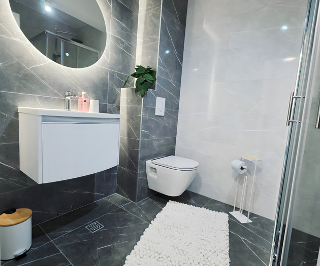 Modern bathroom with sink and toilet