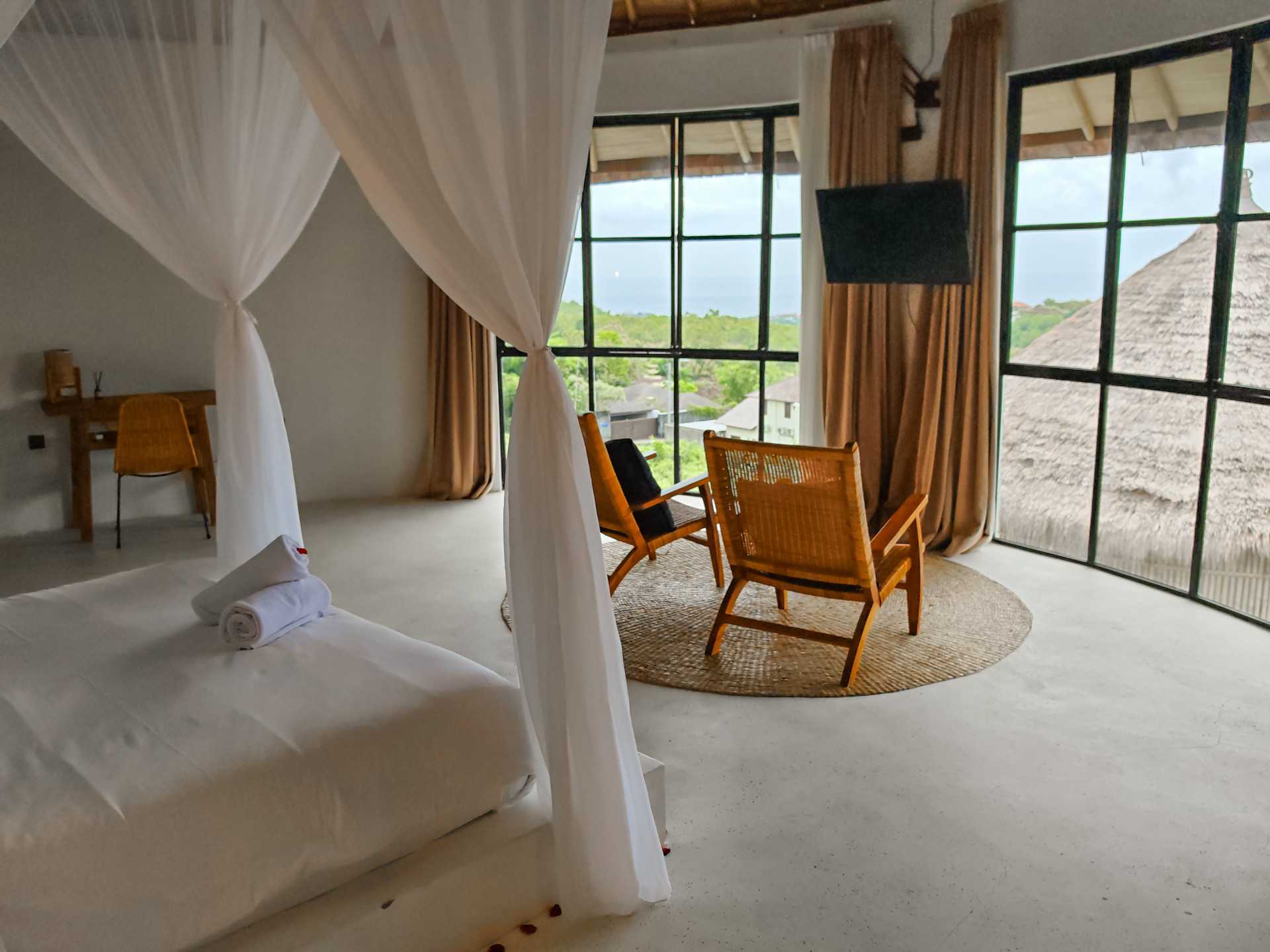 Bedroom canopy bed panoramic view