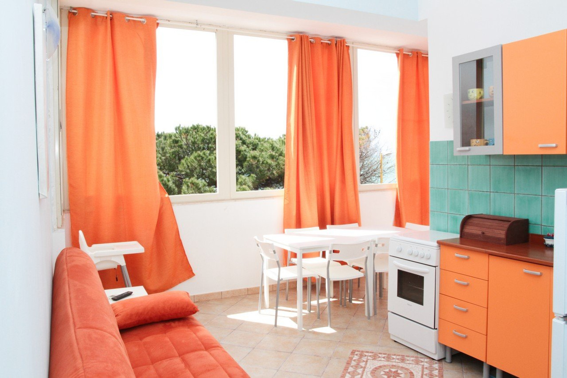 Bright dining area with sea-view windows