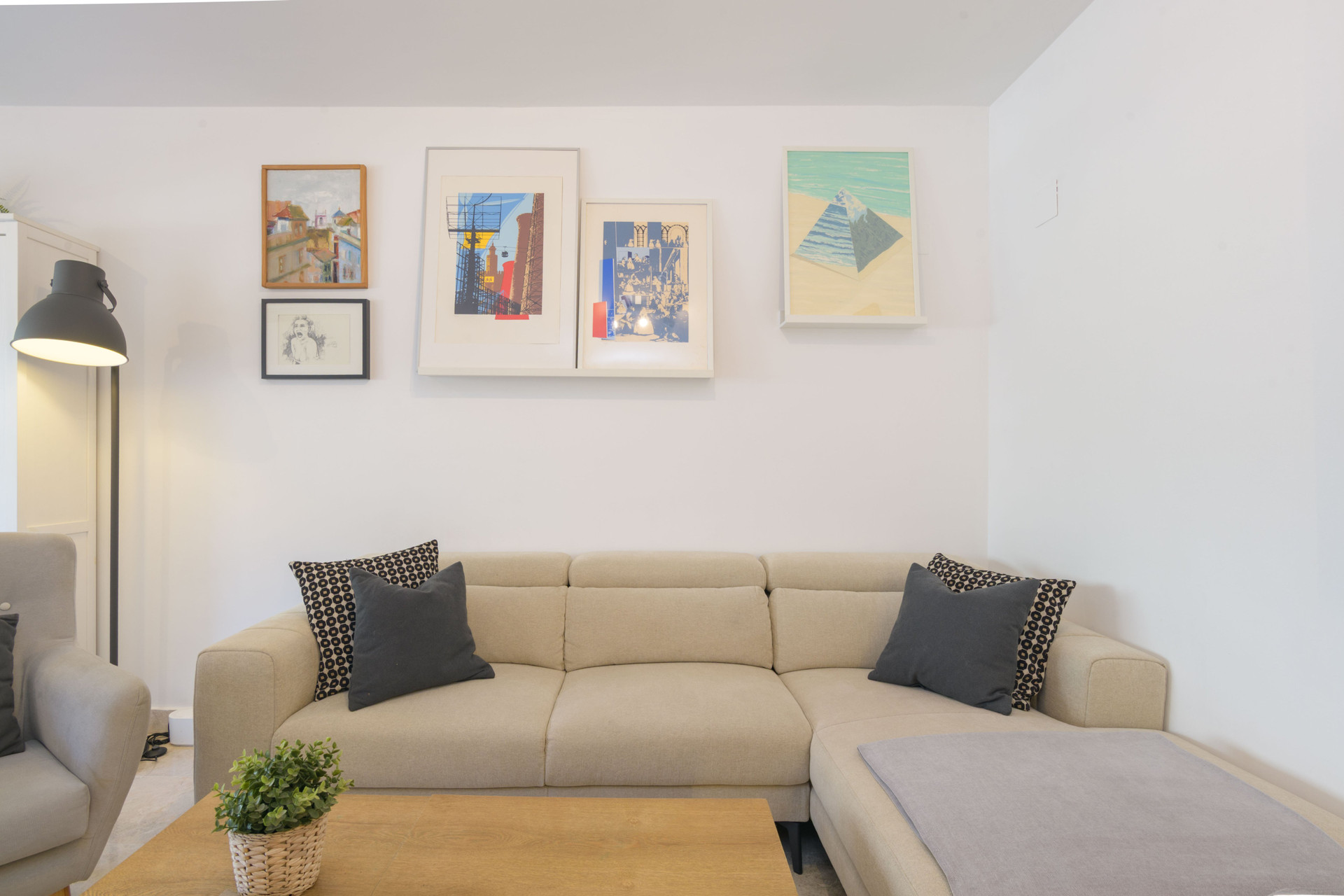 Living room sofa and gallery wall
