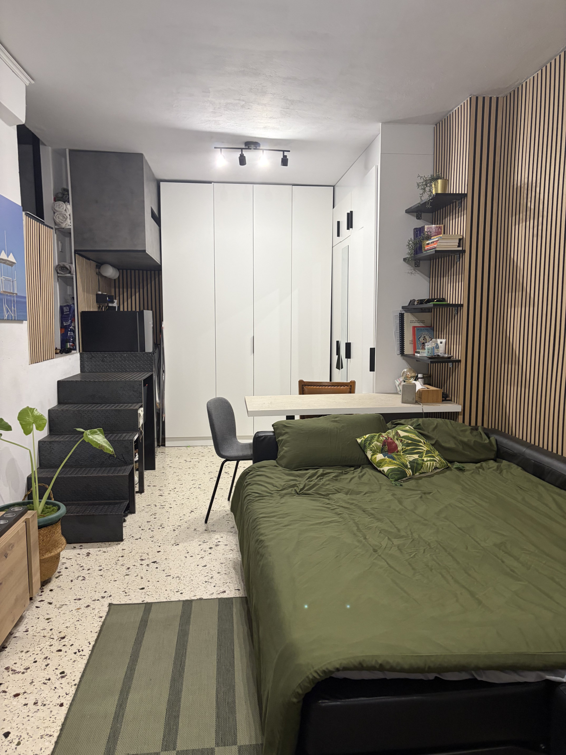 Bedroom with bed and wardrobe