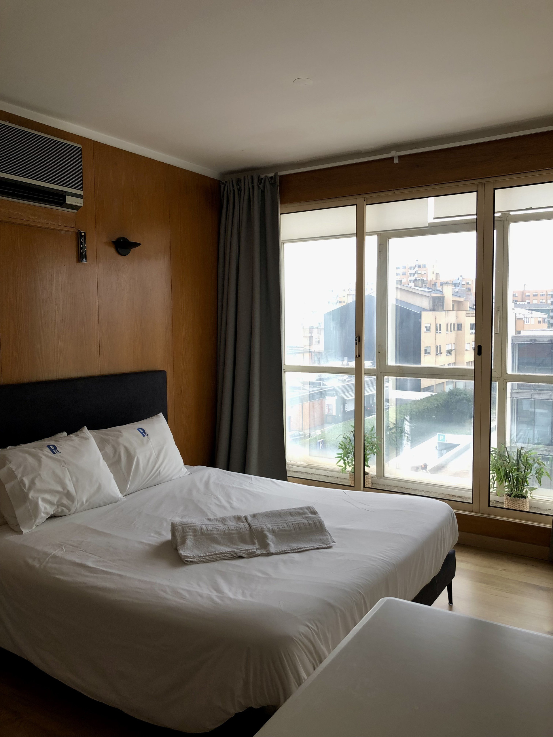 Double bedroom with large windows