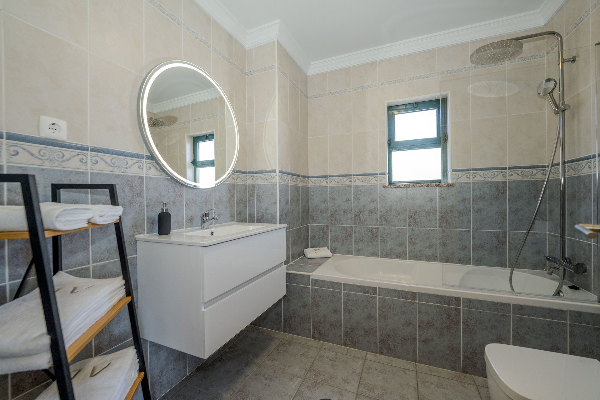 Bathroom with bathtub and shower