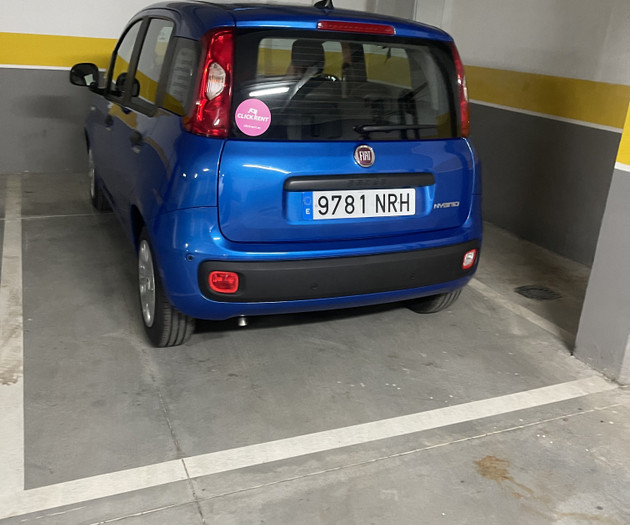 Parking garage with car