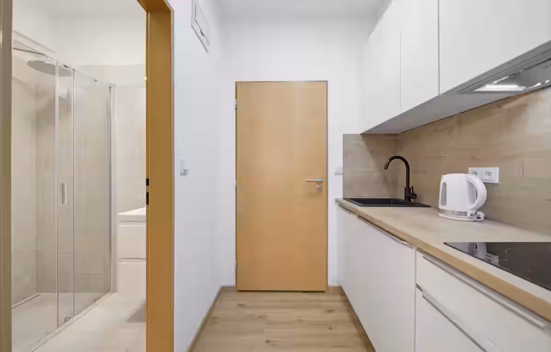 Hallway leading to kitchen