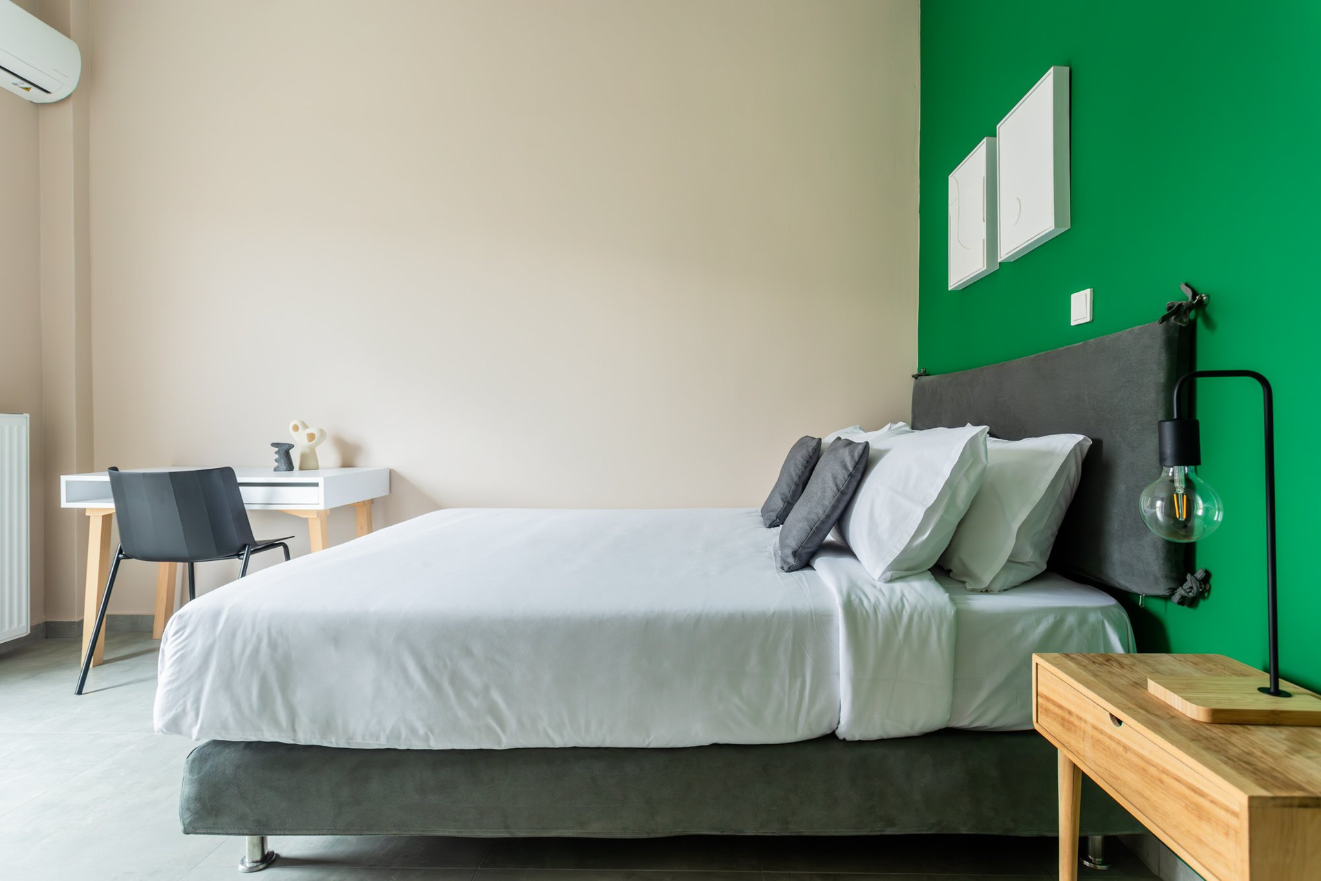 Bedroom with green accent wall
