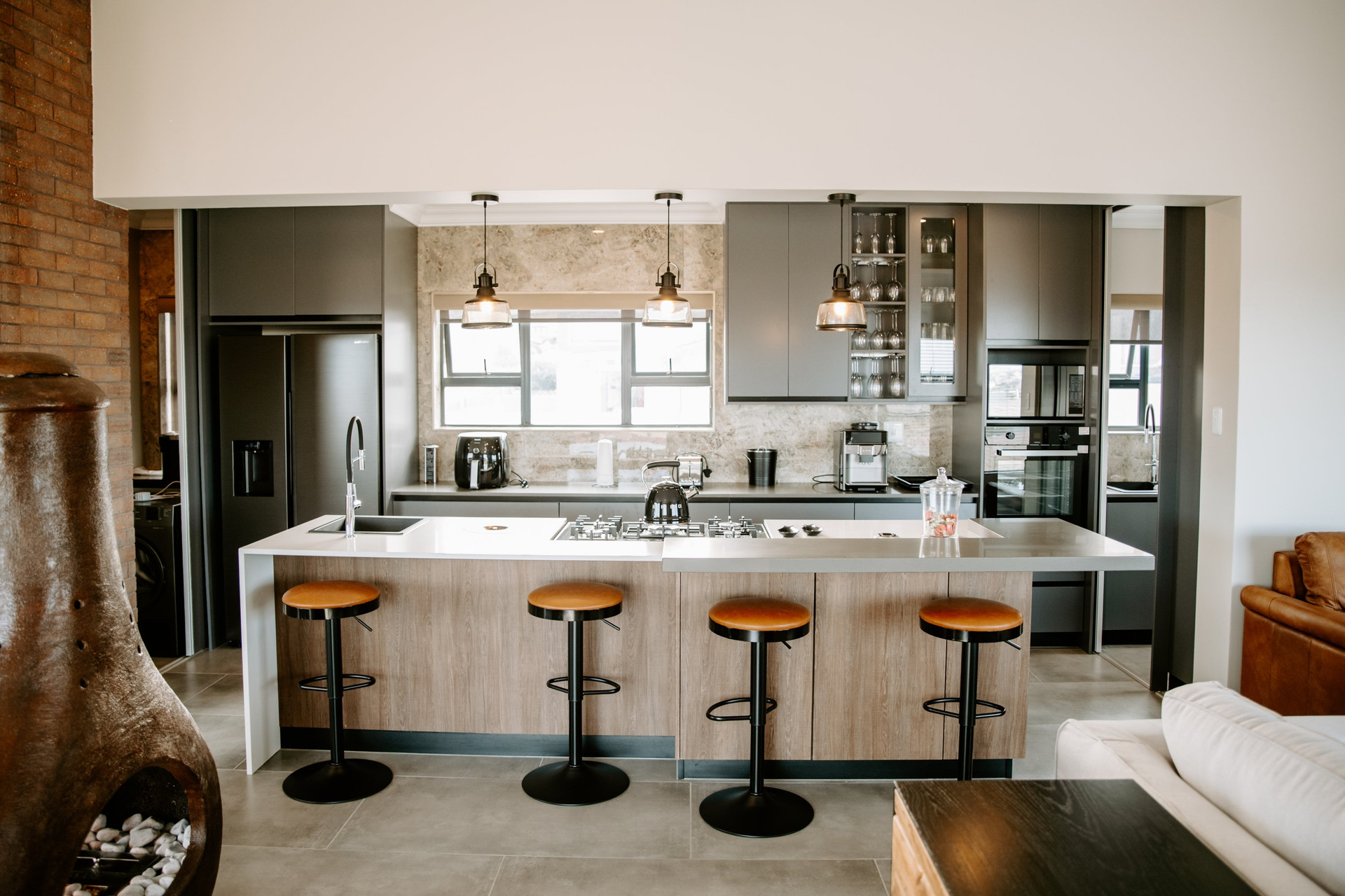 Kitchen island with bar stools