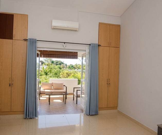 Bedroom leading to balcony