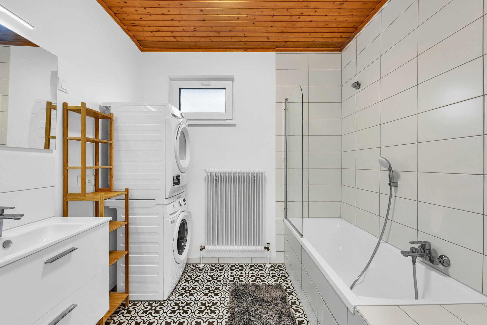 Bathroom bathtub washer dryer wooden ceiling