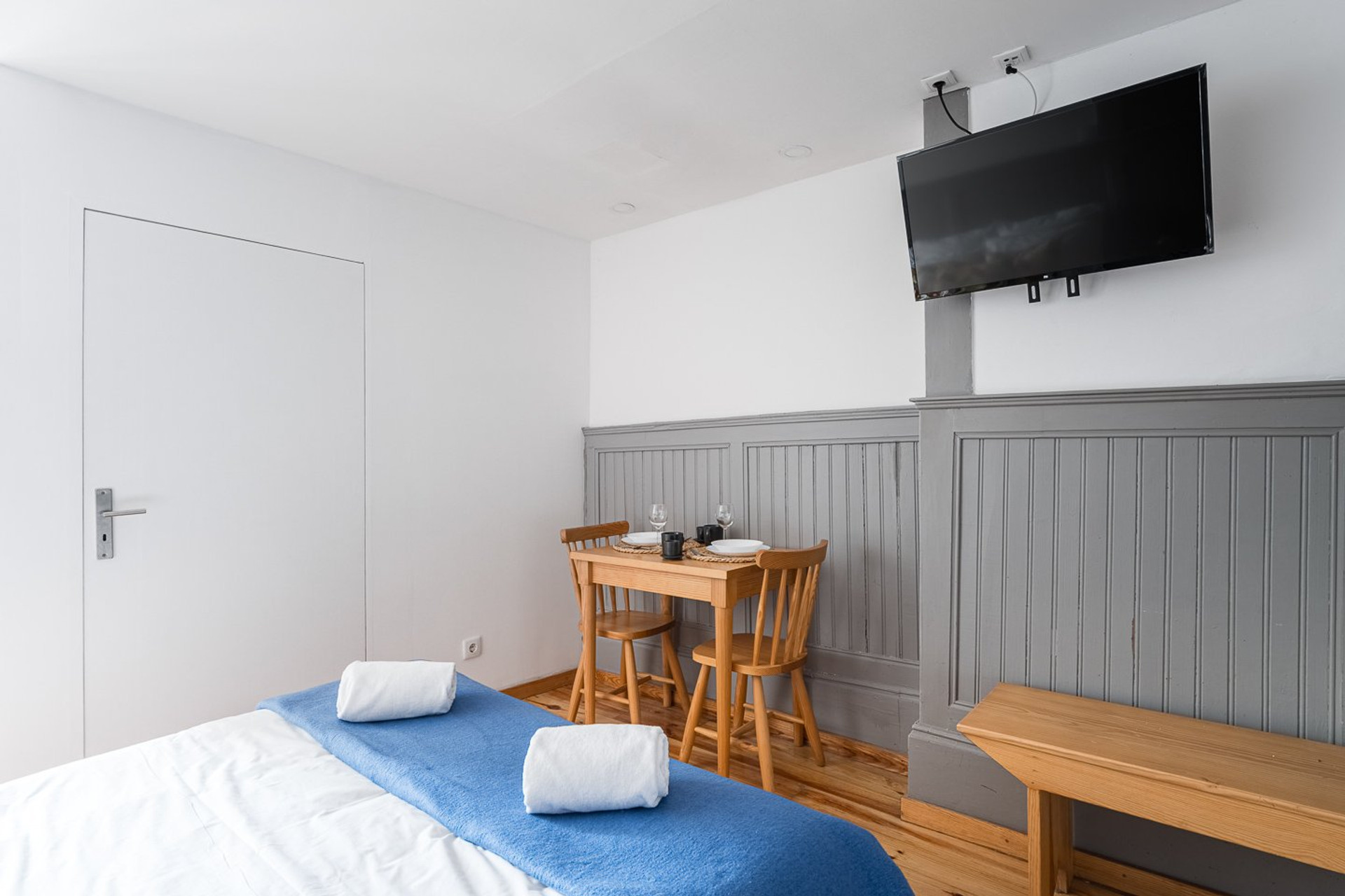 Dining area with wall-mounted TV