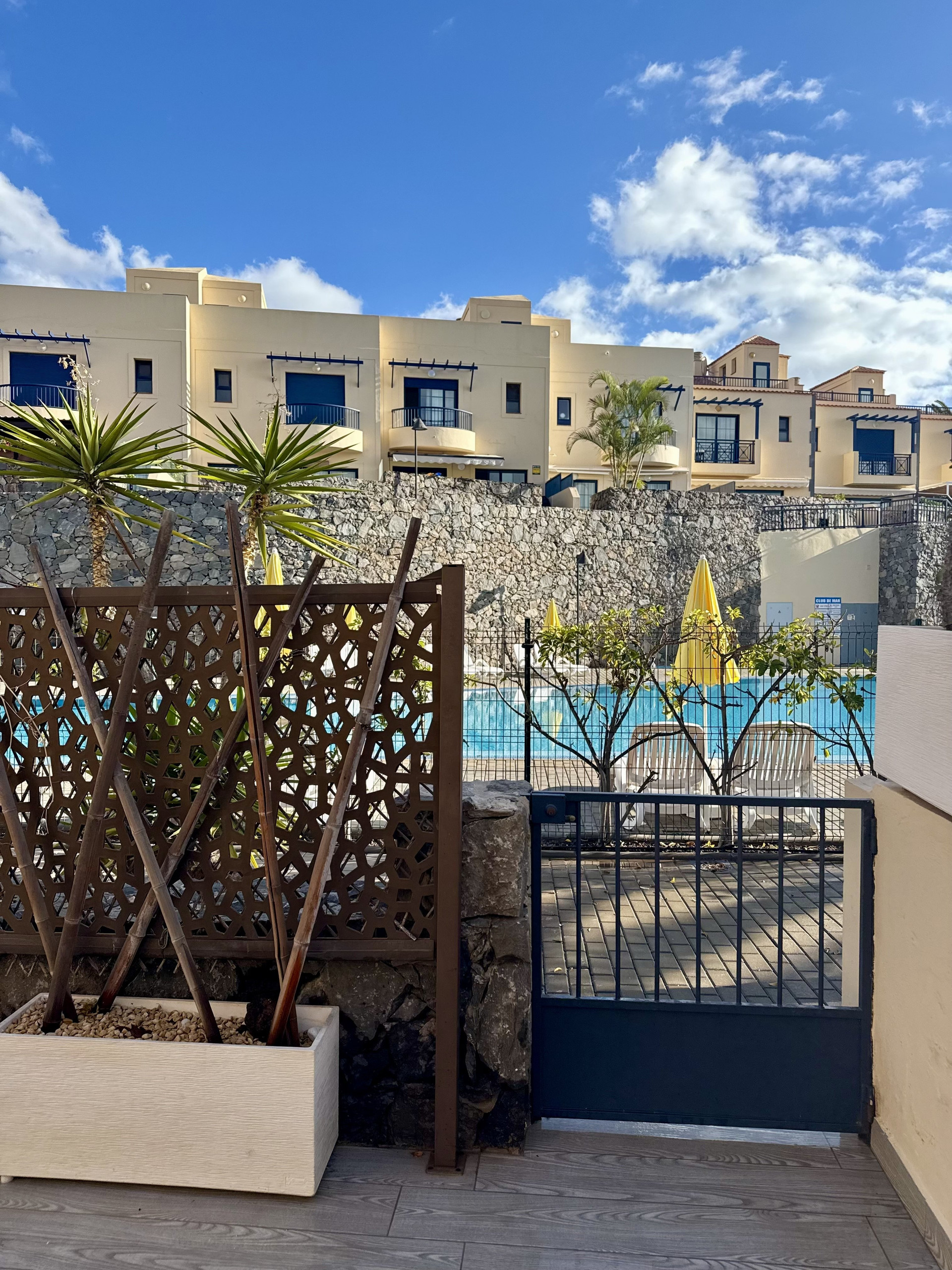Terrace gate overlooking pool
