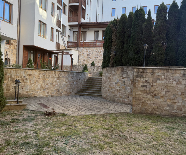 Courtyard with stairs and lawn