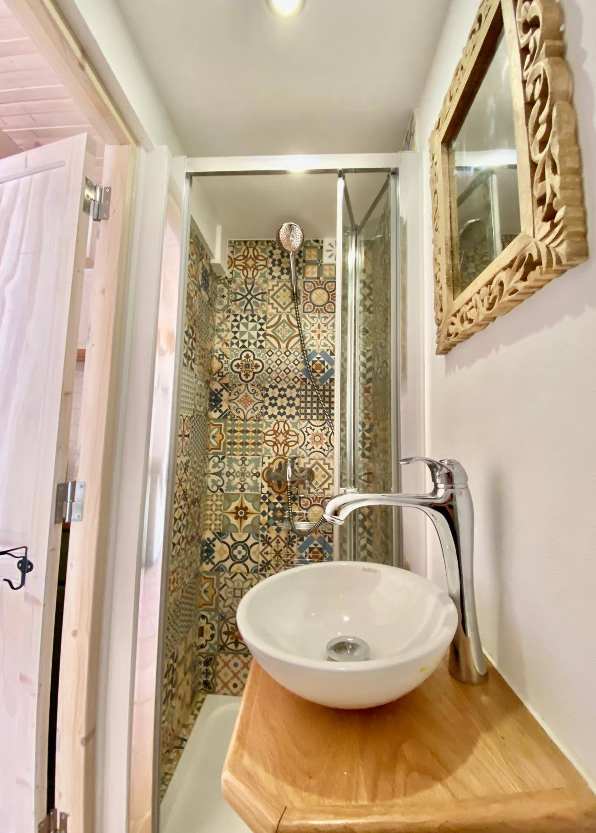 Modern tiled shower and sink