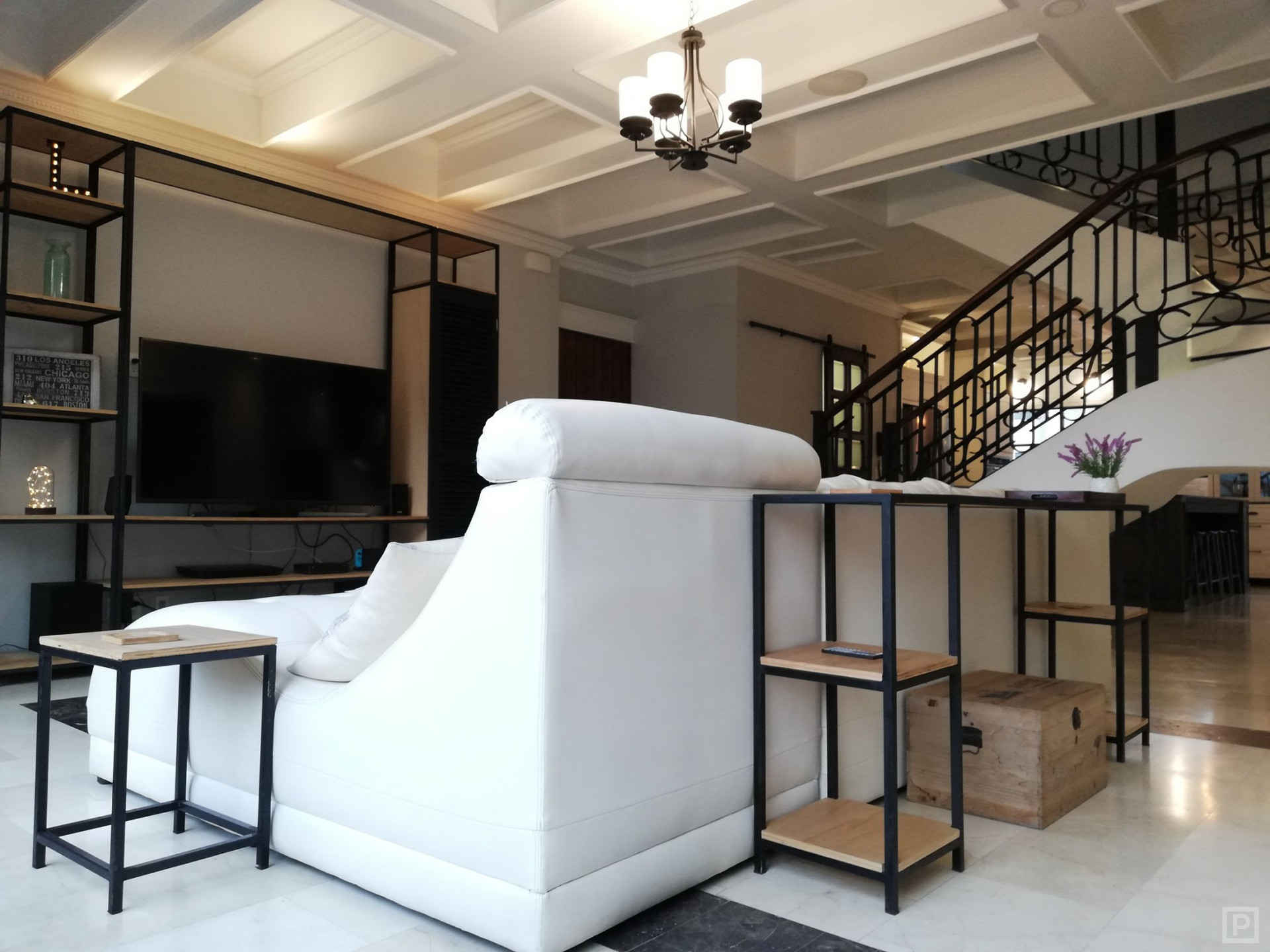 Main living room has wall-to-wall view windows, 65" 4k smart TV, surround sound home theater & more!